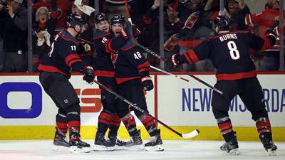 Aho, Martinook cap Hurricanes' late rally to beat the Islanders for a 2-0 playoff series lead