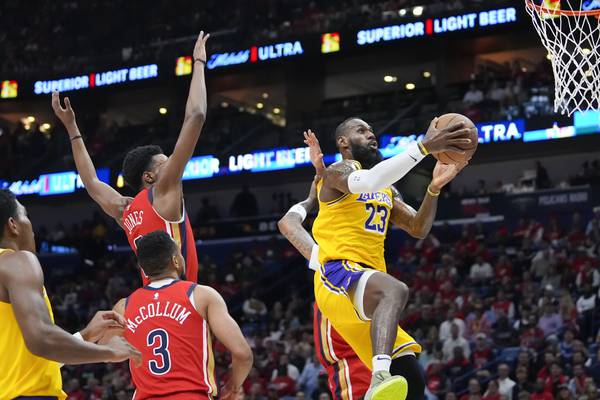 LeBron James and the Lakers secure a playoff berth with 110-106 win over the Pelicans
